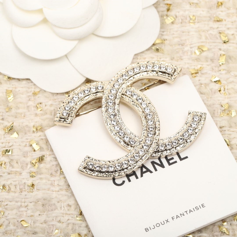 Ch**el brooches